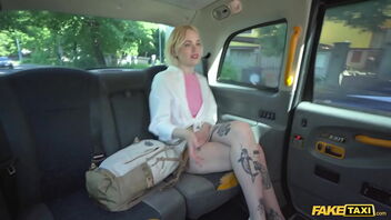 A blonde gets a rough and fast fuck in a fake taxi.