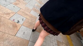 Schoolgirl with dark-hued hair in Shinjuku gets naughty.