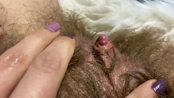 Close up of a big orgasm from a huge clitoris full salute in an amateur video.