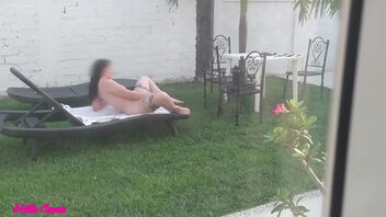 Bare sunbathing stepsister in the garden, squirting orgasm