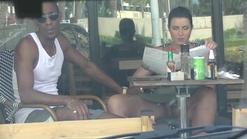 A cheating wifey caught on camera while flirting with a ebony fellow in a cafe.