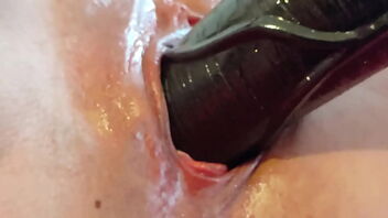 Close up of a big cock dildo in action